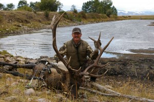 Hunter-Ed Instructor Ed Beall with elk, hunter education concept. 