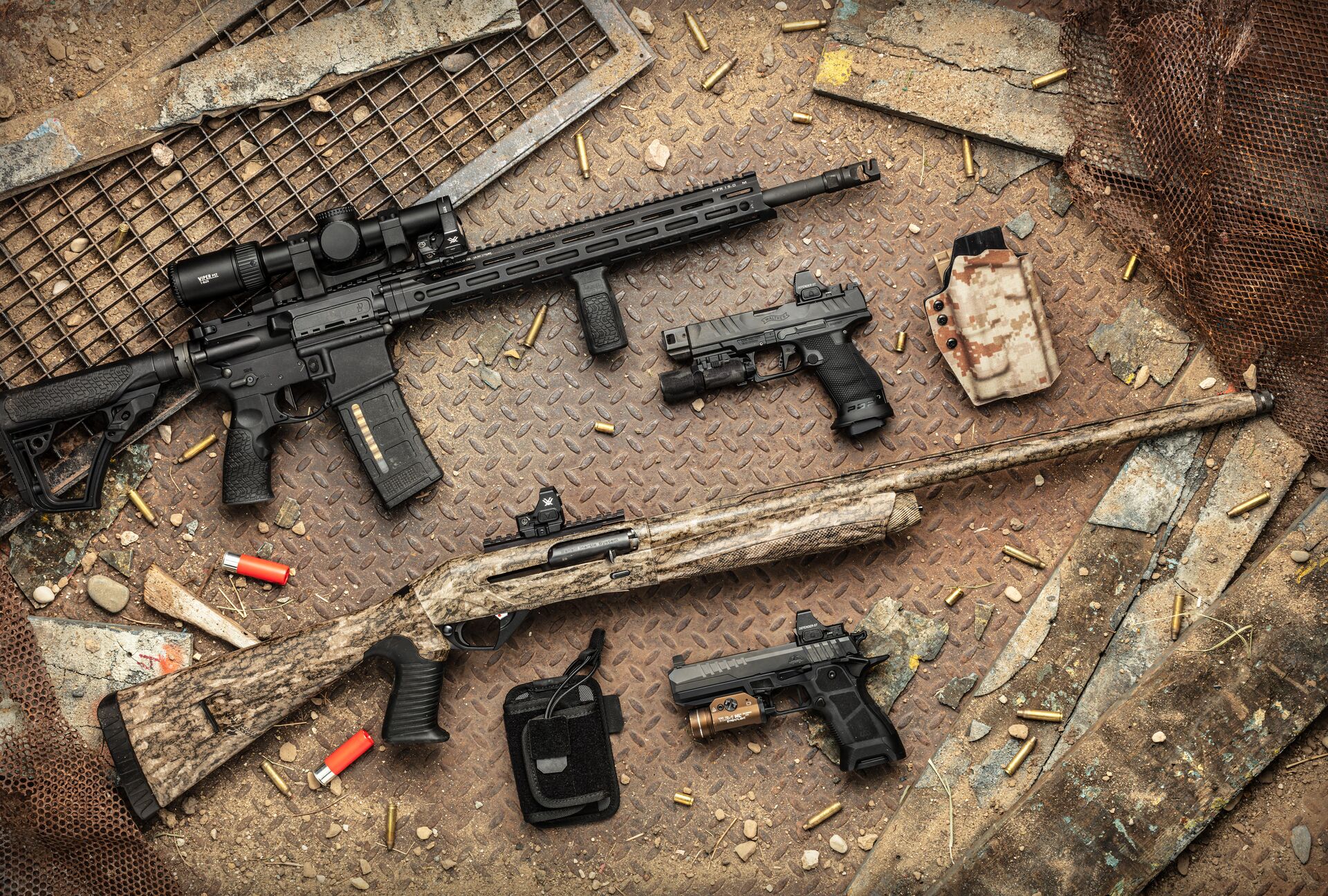 Multiple firearms on a table, is AR-15 legal for hunting concept.