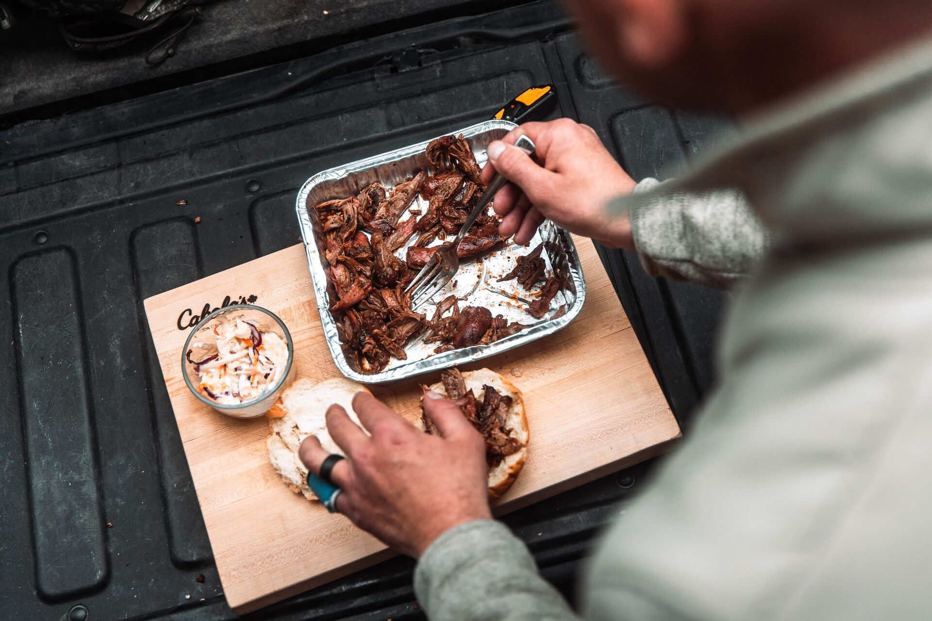 Eating wild turkey prepared after a hunt. 