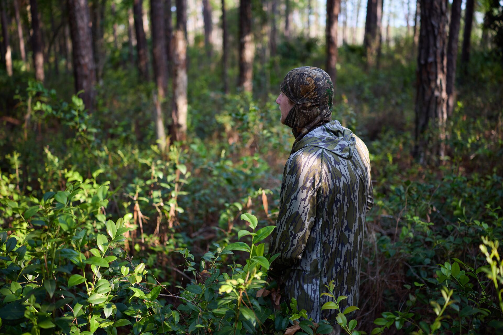 Hunter wears lightweight camo while in the trees.