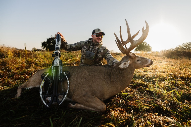 Hunter with big buck after hunt, deer hunting season Texas concept. 