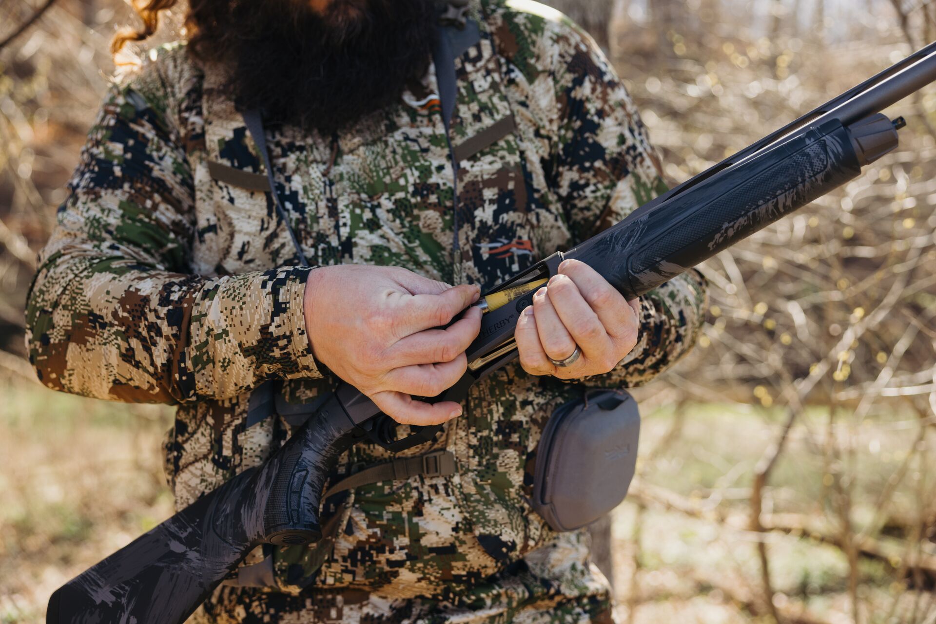 Hunter loading shotgun, how to prepare for hunter education field day concept.