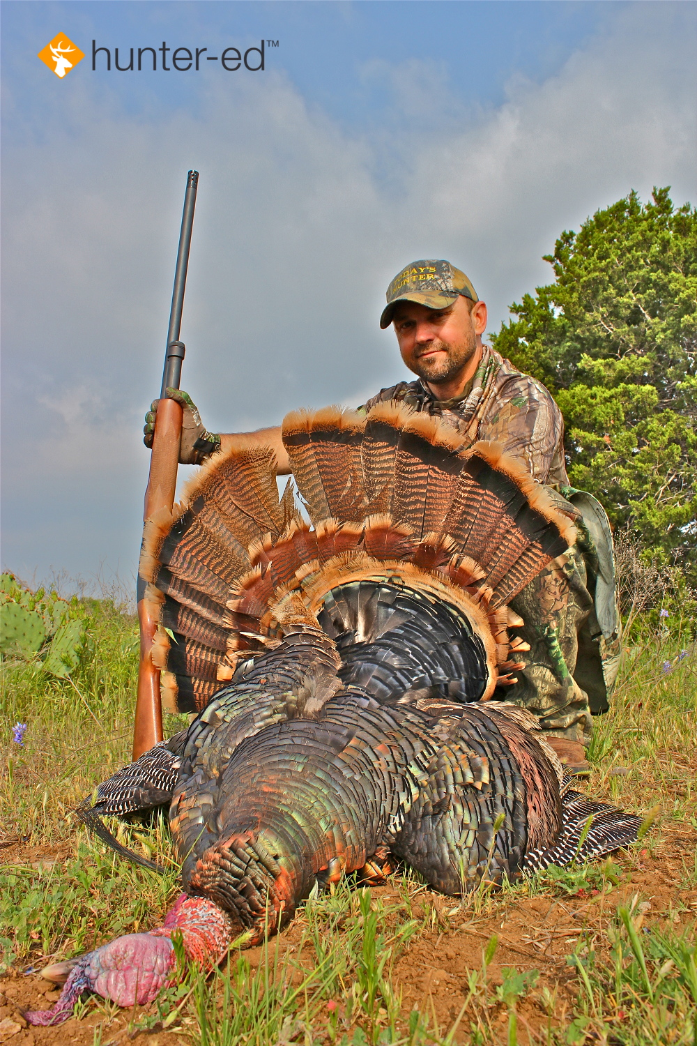 A hunter with a harvested turkey, turkey hunting concept. 
