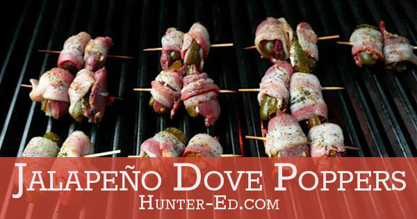 An image of dove poppers on a grill with text Jalapeno Dove Poppers, wild game recipe concept. 