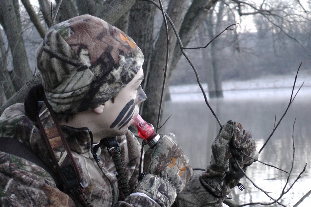 A hunter with a duck call, how to duck hunt concept. 